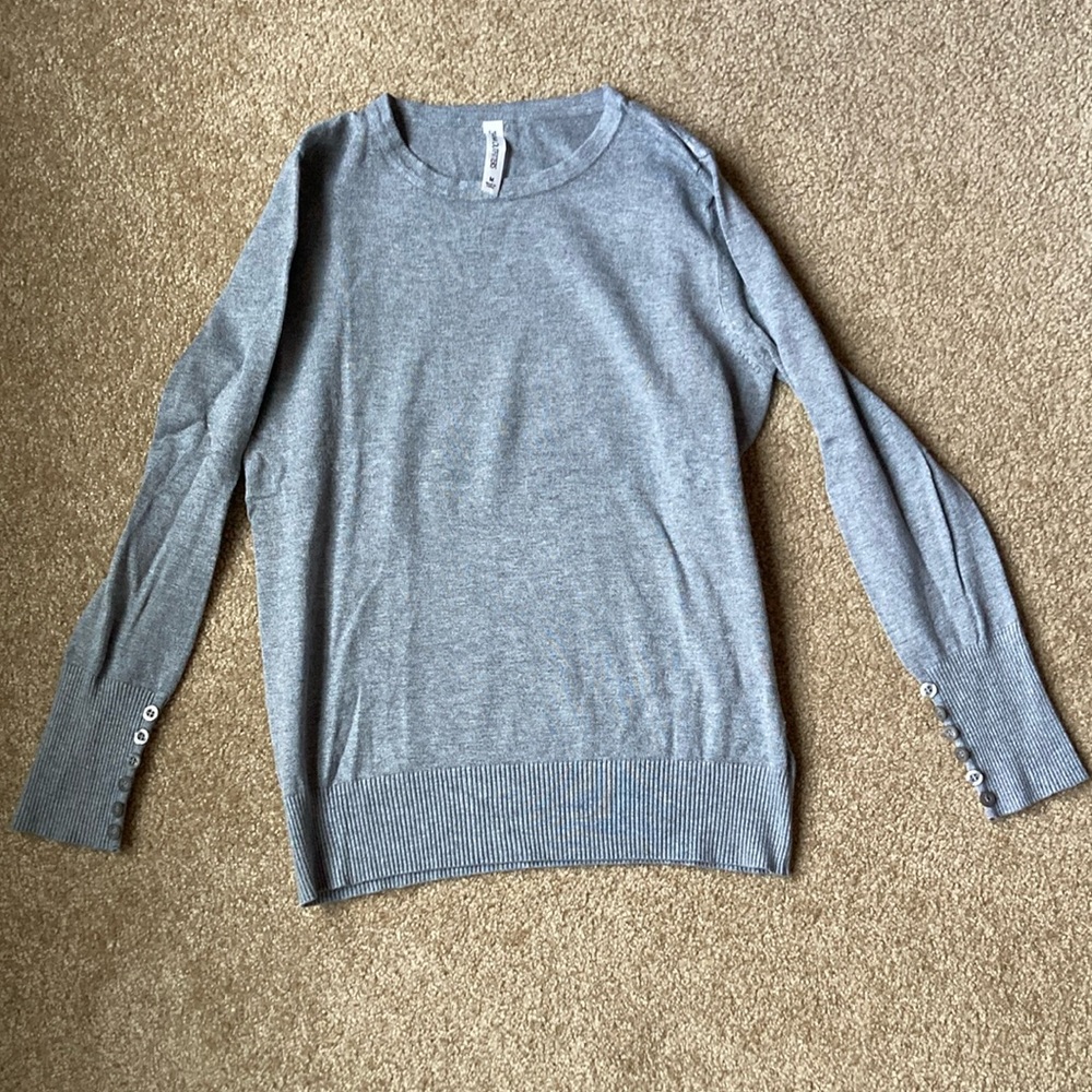 Grey sweater with buttons on sleeves